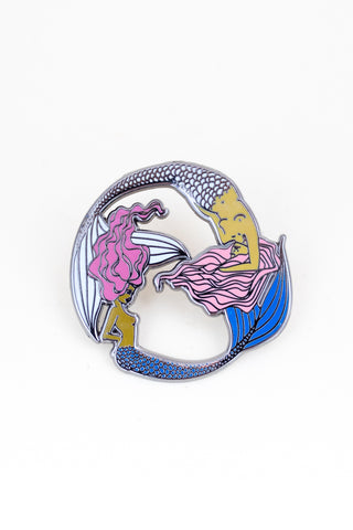 enameled pin of two mermaids. pisces symbol